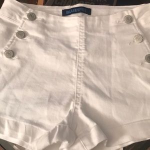 Girls white summer shorts by Bluespice.
